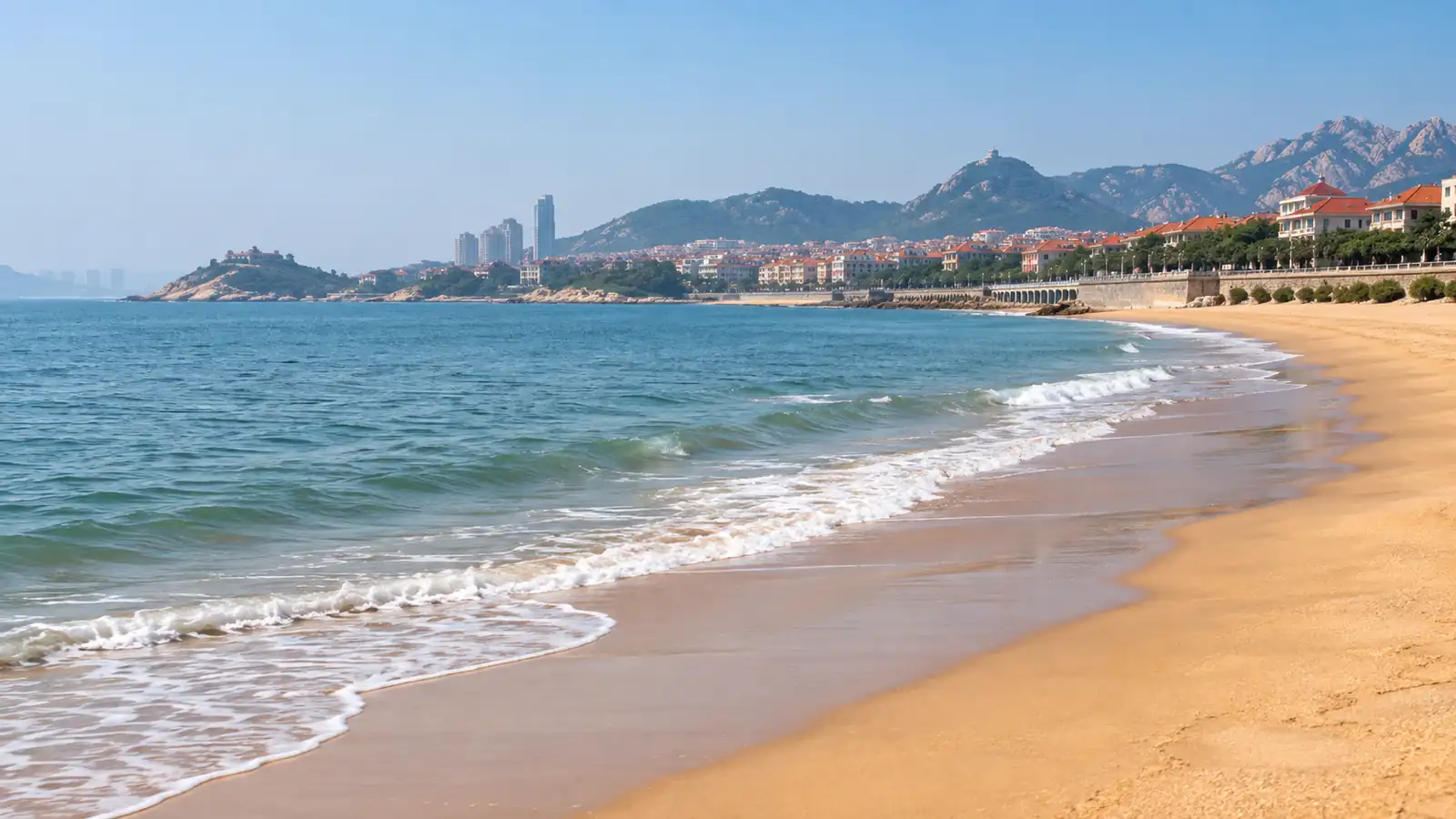 Wide golden shoreline at Qingdao's Golden Sand Beach Wide golden shoreline at Qingdao's Golden Sand Beach