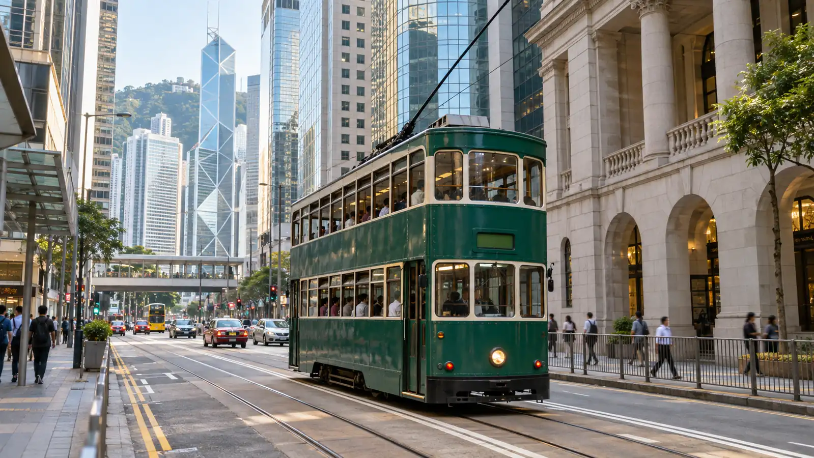 Classic Hong Kong double-decker tram traveling through Central Classic Hong Kong double-decker tram traveling through Central