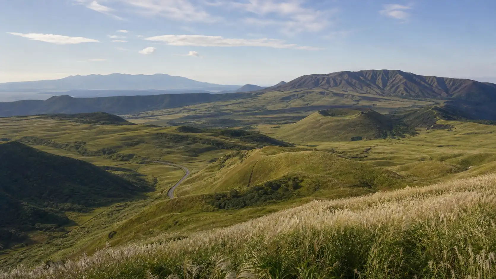 Aso-Kuju National Park caldera scenery Green caldera and volcanic ridges in Aso-Kuju National Park