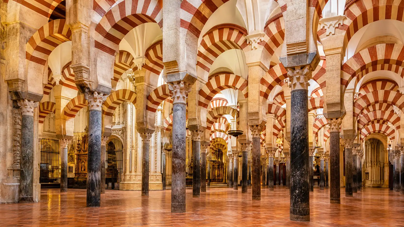 Interior arches of the Mezquita-Catedral in Cordoba Interior arches of the Mezquita-Catedral in Cordoba