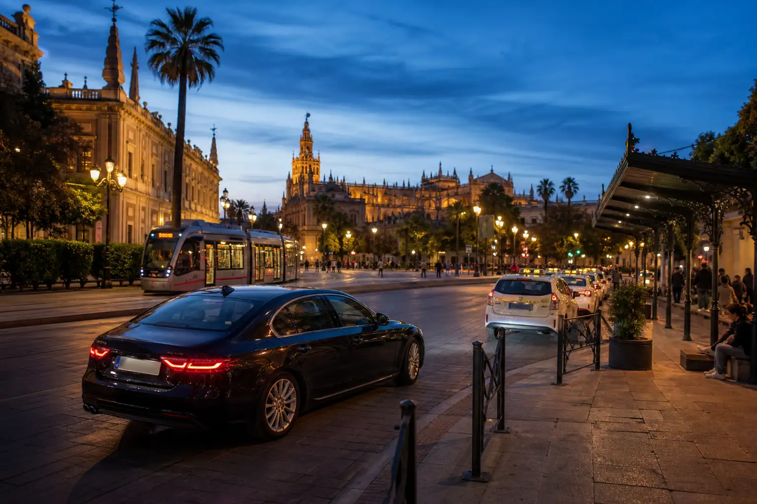 Ride app taxi and tram options in a Spanish city at blue hour